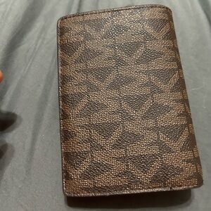 Micheal Kors brown wallet used very little.